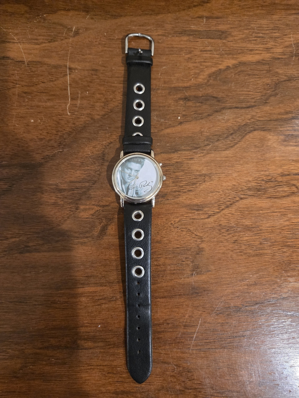 Elvis Presley Leather Strap Watch with Silver Case and Grommet Accents